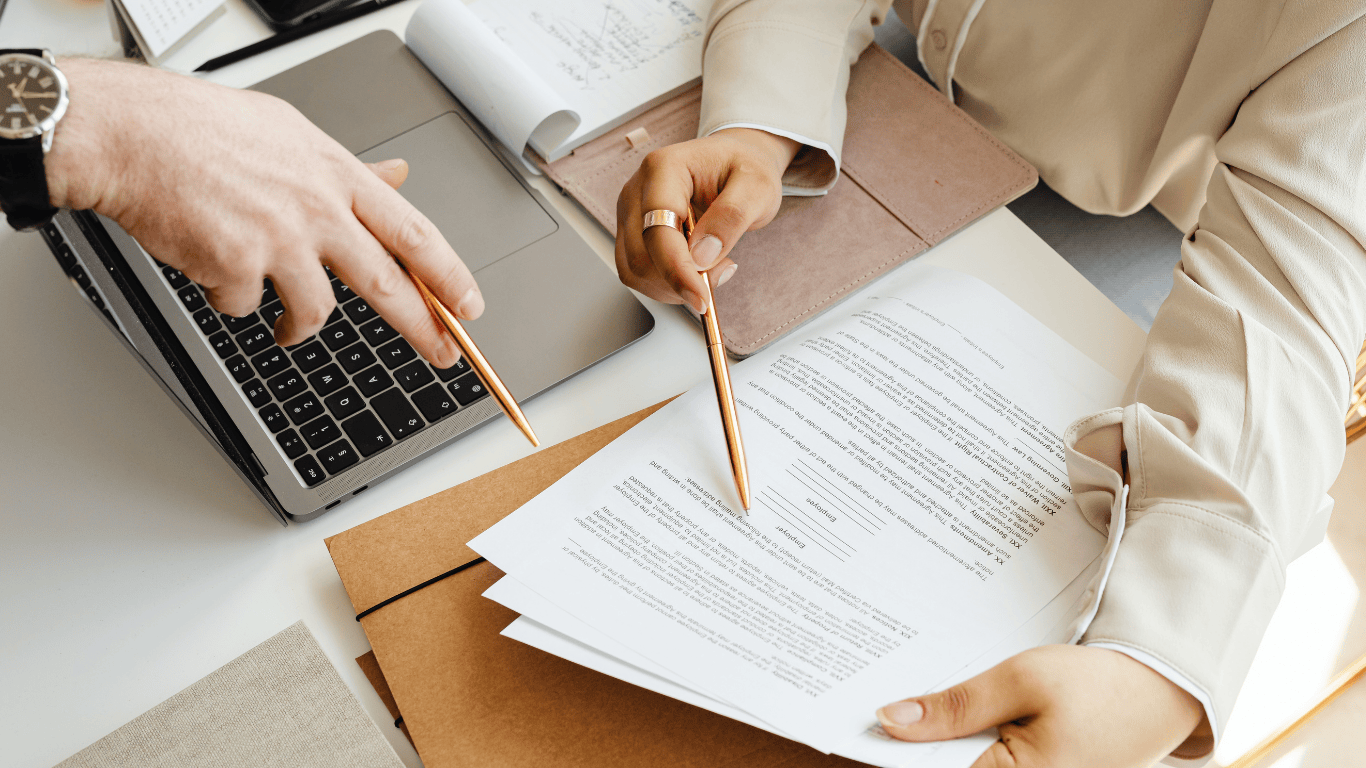 Insurance professional reviewing policy documents